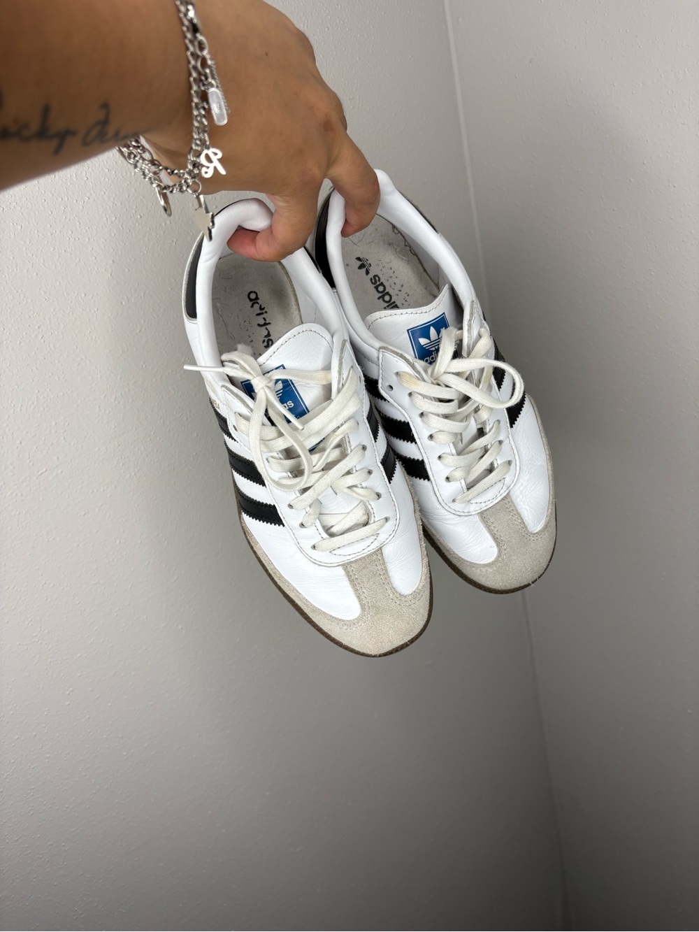 adidas Women’s White Sneakers with Black Stripes